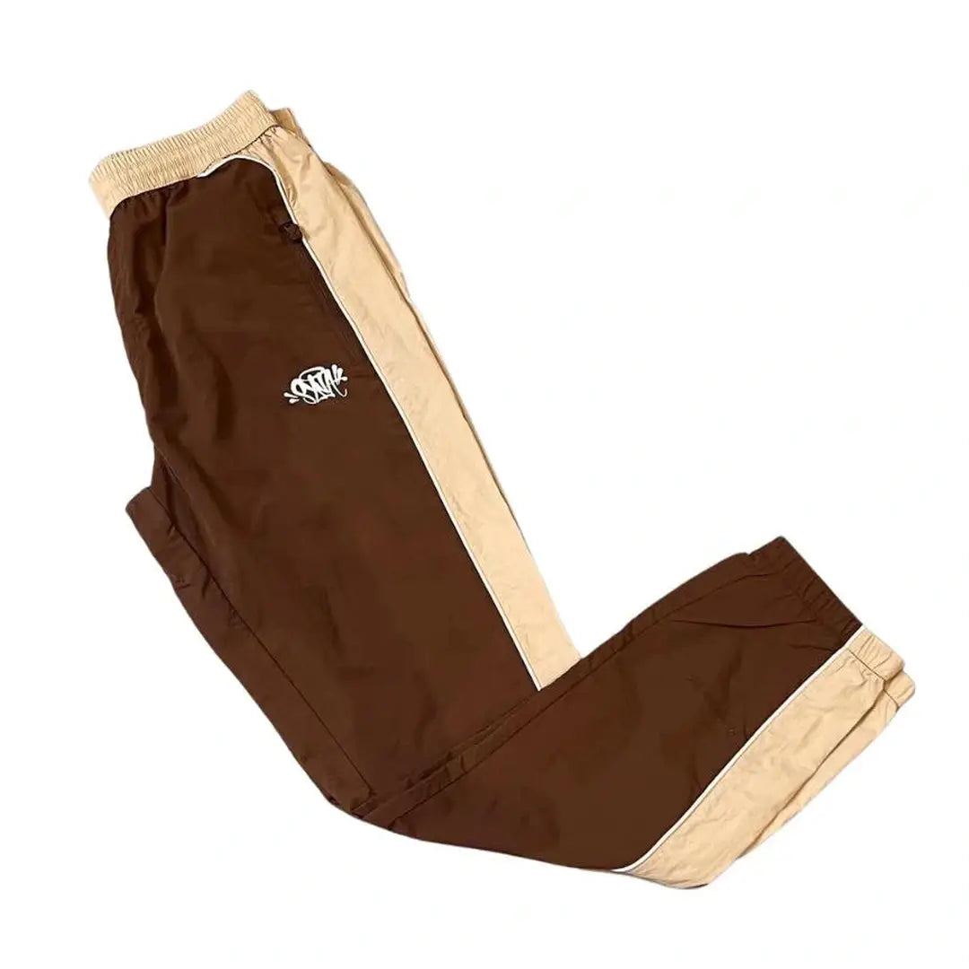 SYNAWORLD ‘SYNA LOGO’ SHELL TRACKSUIT - BROWN/BEIGE | Plugstationuk